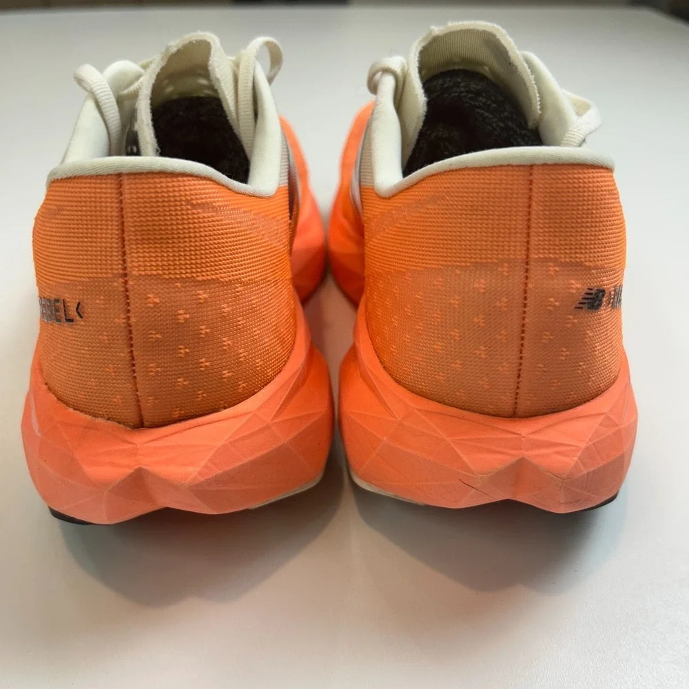 New Balance FuelCell Rebel v4 Mens 11 Wide 2E Orange White Running Shoes MFCXCO4